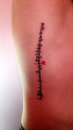 artistic block script with red ka